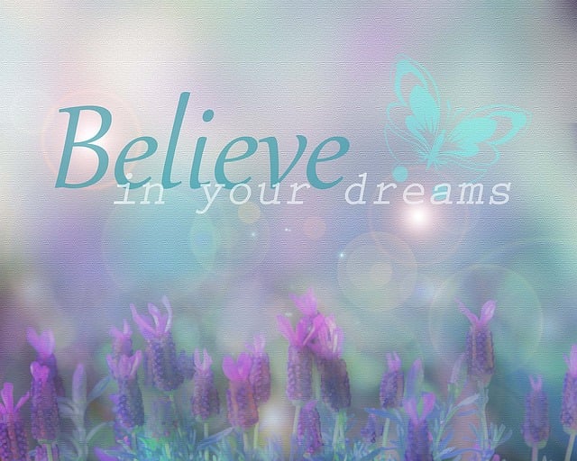 The quote “Believe in Your Dreams” on a flowery background.